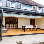 A {house} with a {patio} and a {glass door} in Tetbury.